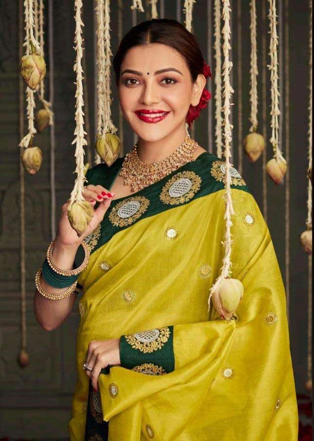 Golden Yellow saree Paired With Bottle Green Blouse